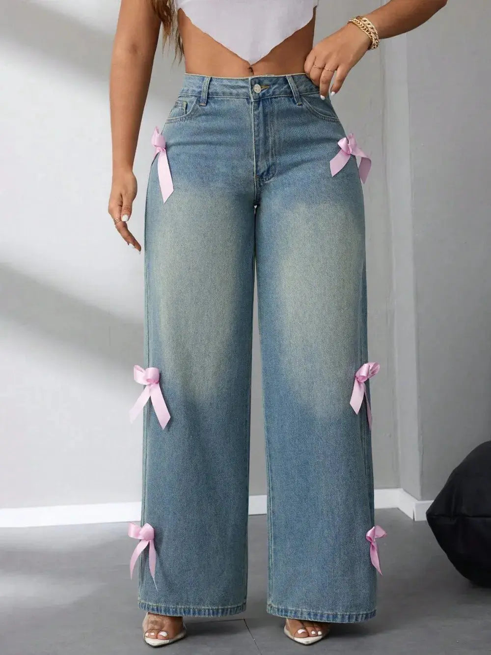 Pantalon en jean taille haute à jambes larges avec nœud eprolo