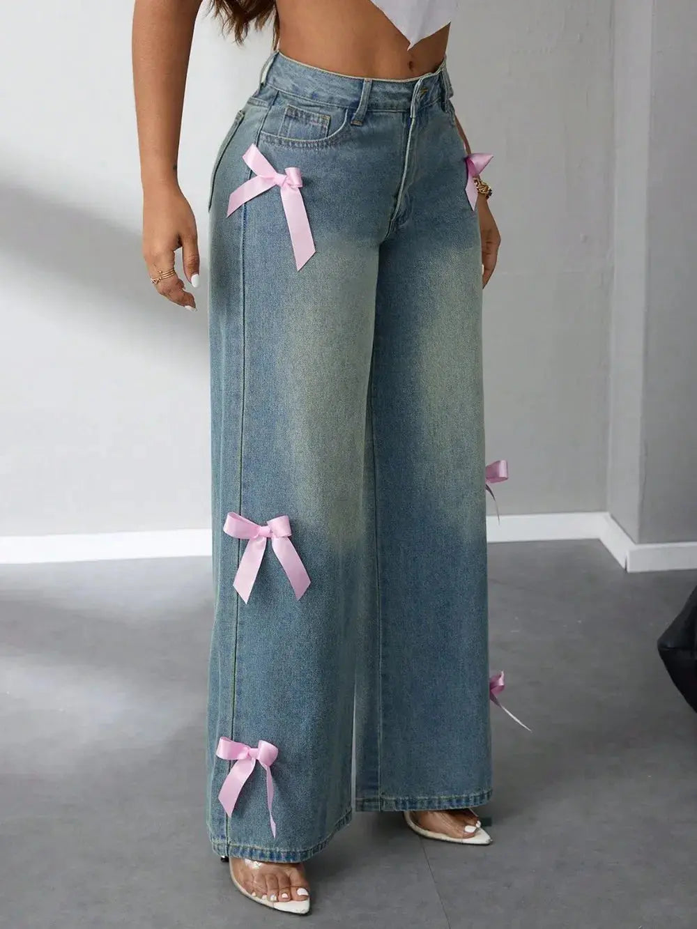 Pantalon en jean taille haute à jambes larges avec nœud eprolo