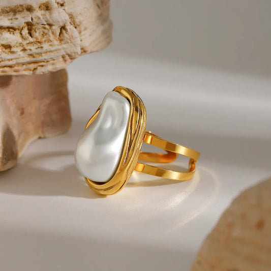 Bague ouverte en acier inoxydable avec perle. eprolo