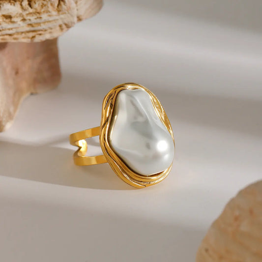 Bague ouverte en acier inoxydable avec perle. eprolo