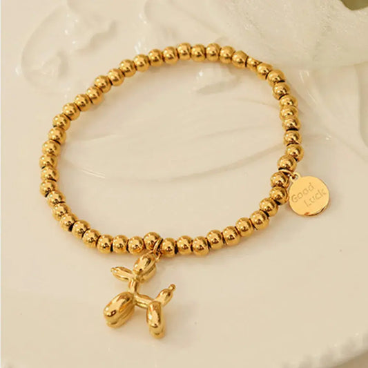 Bracelet à breloques en acier titane plaqué or 18 carats en forme de chiot eprolo