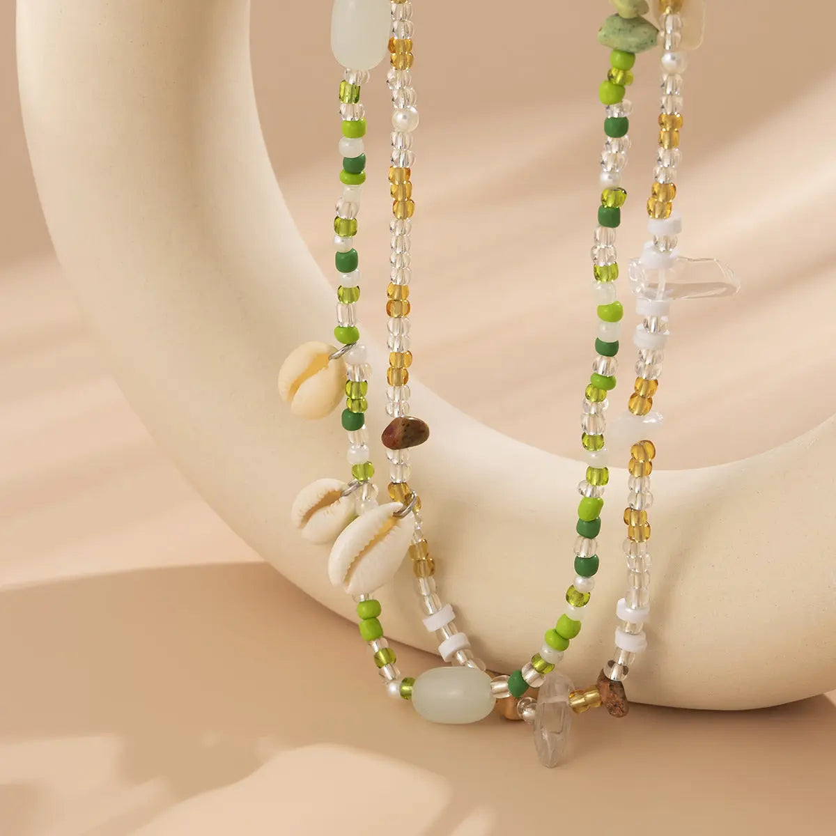 Chaîne de taille double couche en perles de riz et Coquillages. eprolo