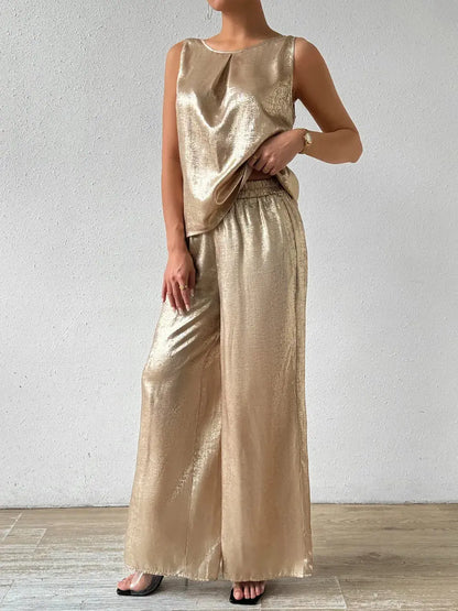 Ensemble haut sans manches et pantalon large tombant, brillant doré. eprolo