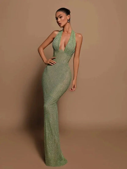 Robe longue Jenna, robe moulante pailletée, décolleté en V profond et dos nu. eprolo