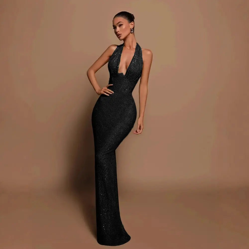 Robe longue Jenna, robe moulante pailletée, décolleté en V profond et dos nu. eprolo
