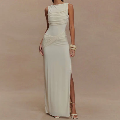 Robe longue Maéva, col rond et dos nu, sans manches, plissées , fendue et ajustée. eprolo