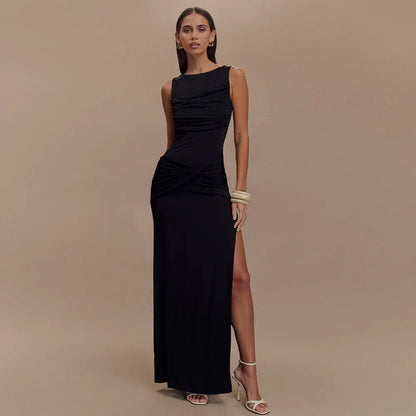 Robe longue Maéva, col rond et dos nu, sans manches, plissées , fendue et ajustée. eprolo