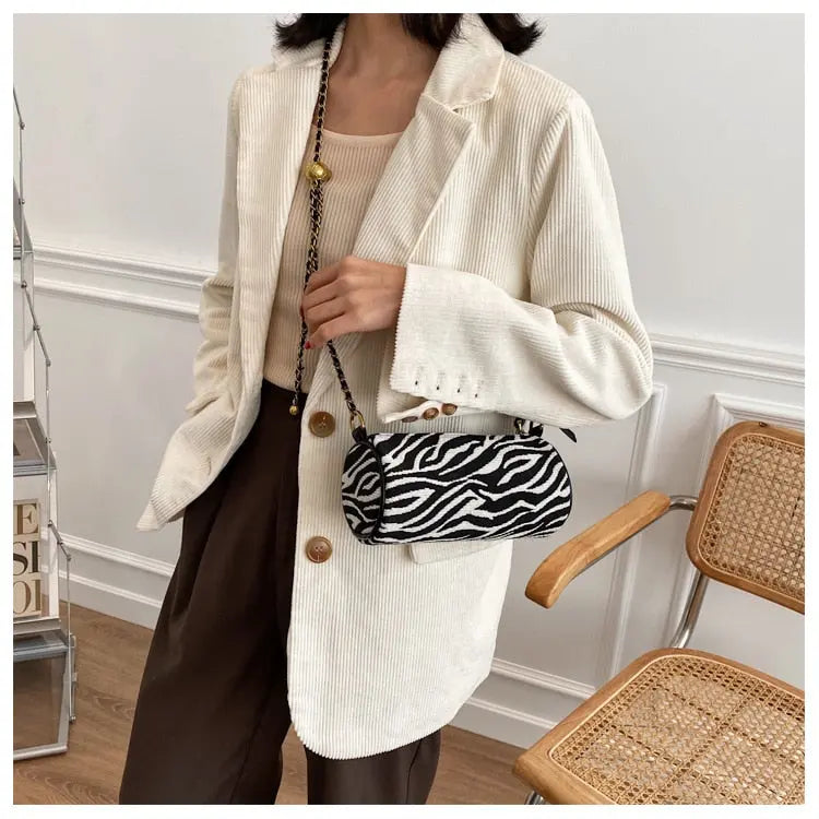 Sac à main, à bandoulière à rayures zébrées, forme de cylindre, petite chaîne, en coton. eprolo
