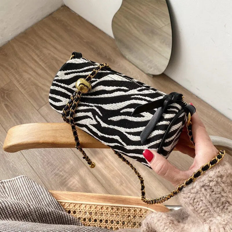 Sac à main, à bandoulière à rayures zébrées, forme de cylindre, petite chaîne, en coton. eprolo